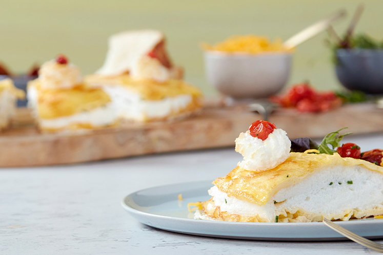 Roerei, briochebrood en buikspek