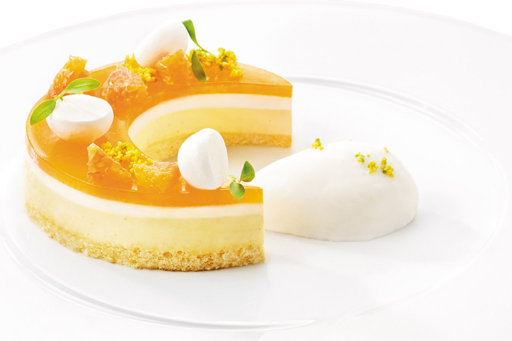 Citrustaartje met geitenkaassorbet en couscous van pistache