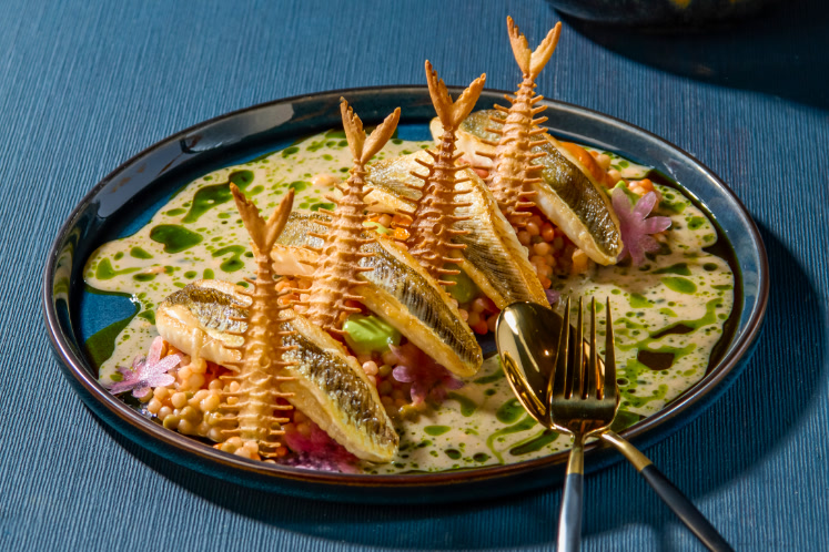 Pieterman op wortelcouscous met een beurre blanc van grapefruit