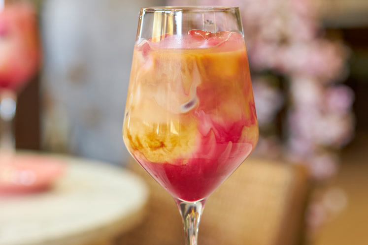 Pink drizzle iced latte